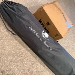 The California Beach Co. Black Play Tent with padded play mat